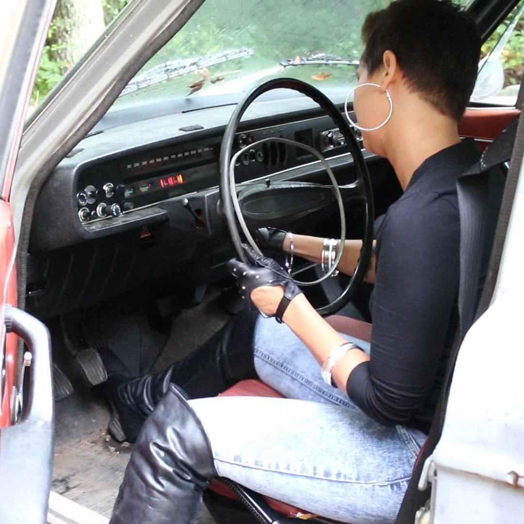 Jane Rainy Cranking the Volvo in Boots & Gloves