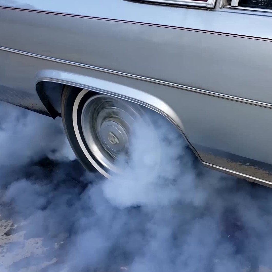 Vivian Getting the Caddy Tuned Up for Burnouts at the Shop, 2 of 2